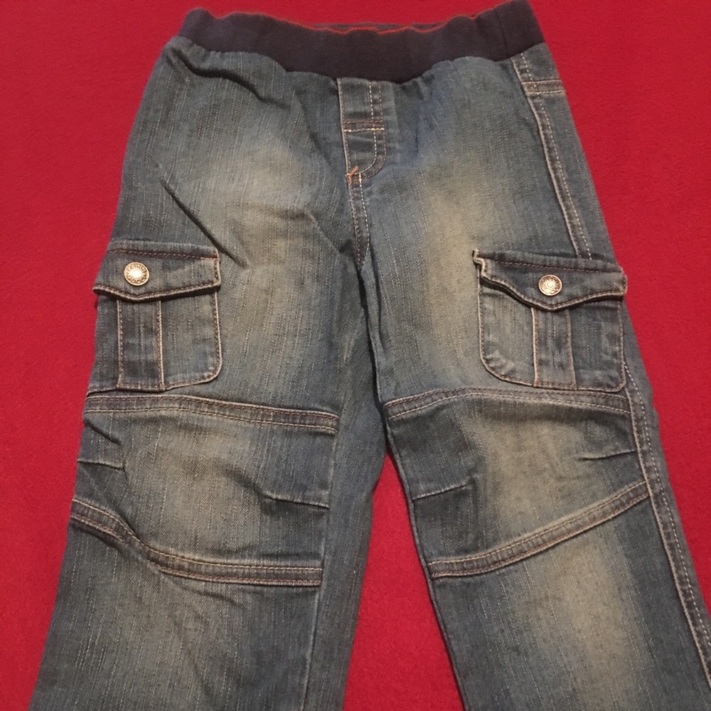Authentic Gucci blue jeans with monogram waistband